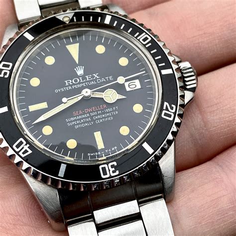 rolex dive watch side profile.